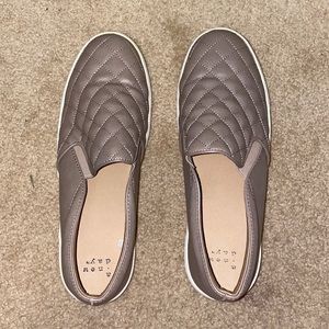 A new day pair of women’s size 9 shoes.